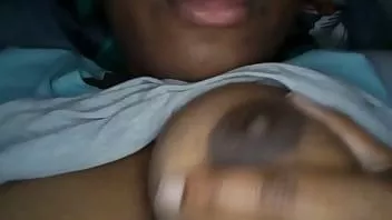 play I make myself really wet by licking and sucking my nipples. then i rub my pussy to some hot porn under the covers